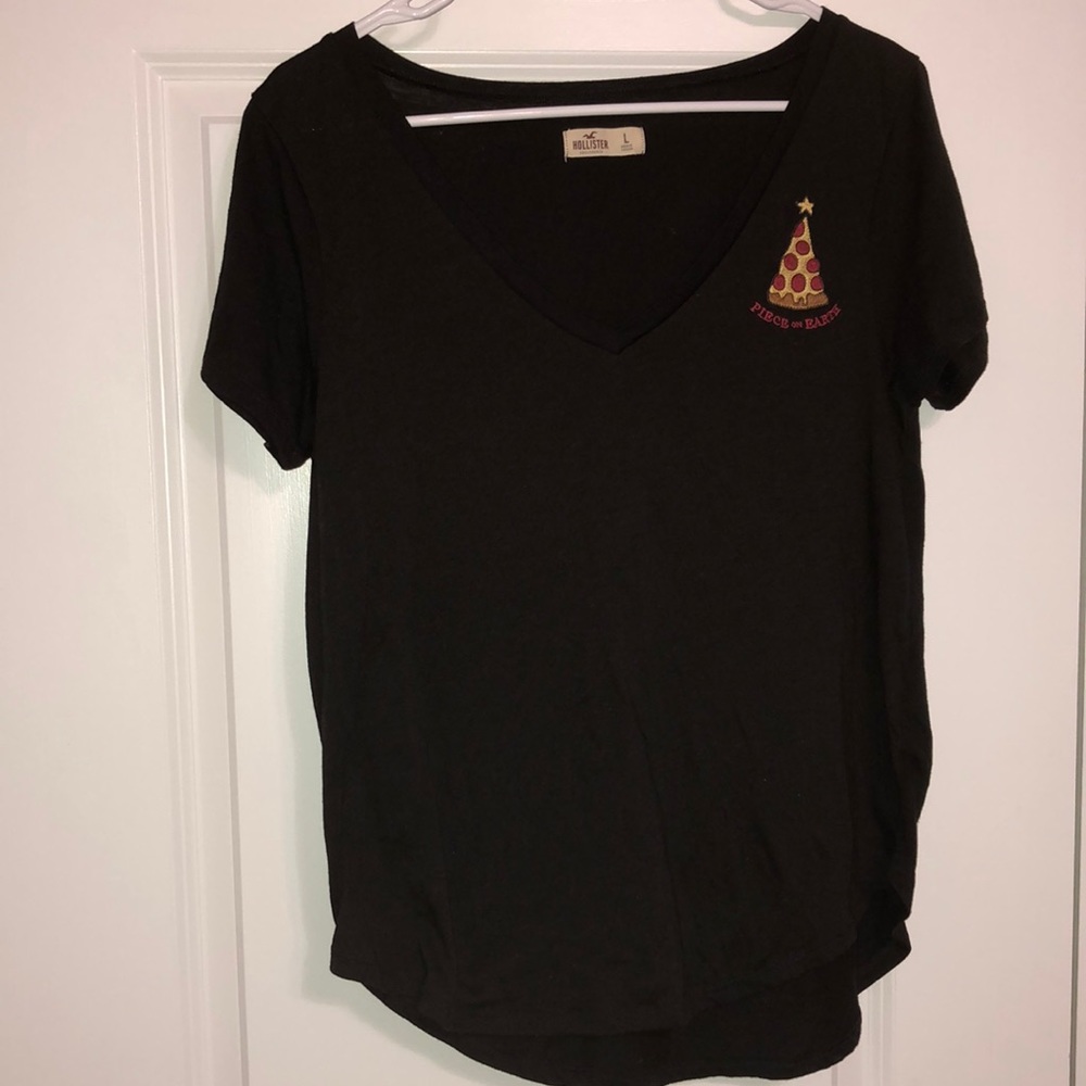This Hollister top is black with embroidery.